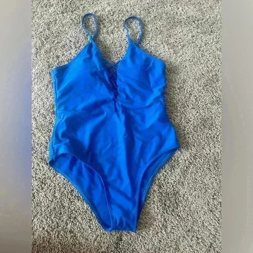 Blue women one piece bathing suit.